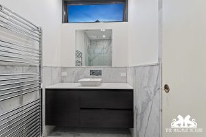 Fressa-marble--sandblasted-and-brushed--vanity-top-in-thassos-marble